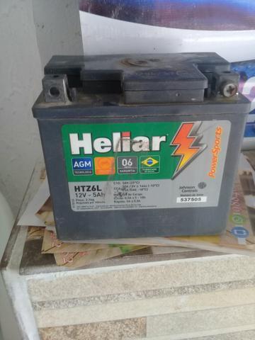 Bateria heliar de moto boa R$80