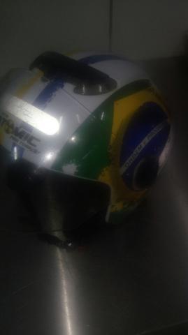 Vendo ou troco capacete e manete pro outro capacete volto dinheiro