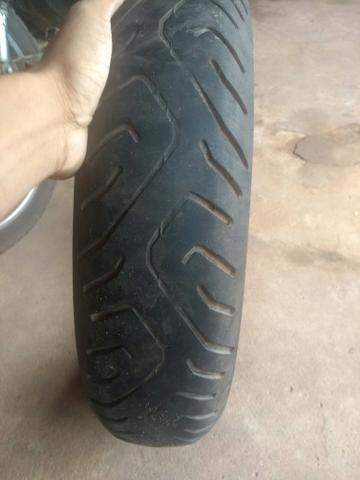 Troco ou vendo pneu da twister traseiro e cubo com raio inox