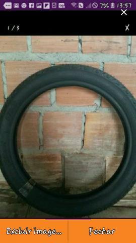 Vende-se um pneu traseiro com camera aro 909018