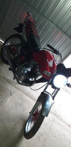 Titan top no extrato - 2003