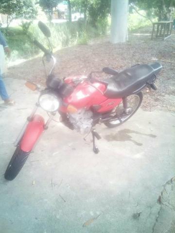 Vendo esta moto titam125 - 2002