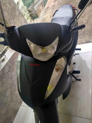 Vendo uma biz 125 ano 14/15 em dias só transferir valor 5.200 - 2014