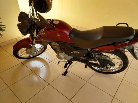 Vende de ou troca por biz 5.500 - 2012