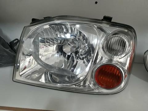 Farol LE Nissan Frontier 2003/2007 Original