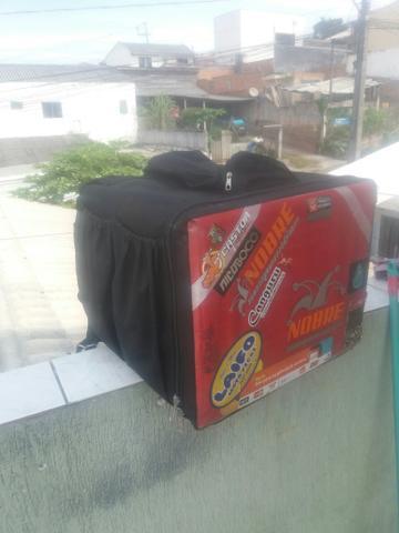 Escapamento e bolsa de entrega