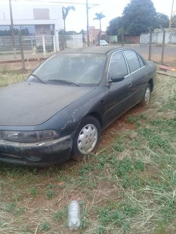 Vendo esse Mitsubishi ou troco por moto ta sem o distribuidor de corrente - 1994