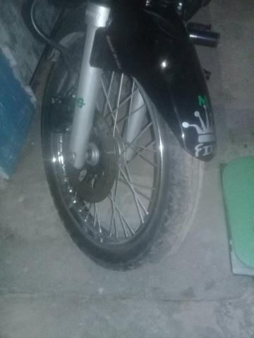 Quero trocar meus aros original completo da 150 freio a disco