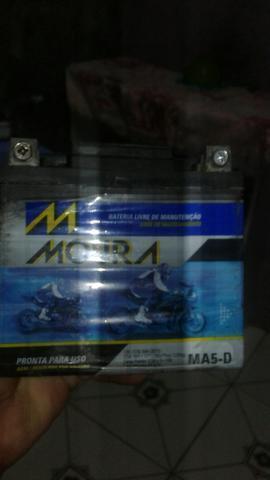 Vendo ou troco p bagageiro bateria Moura $65