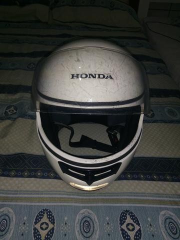 Vendo capacete marca Honda bem conservado